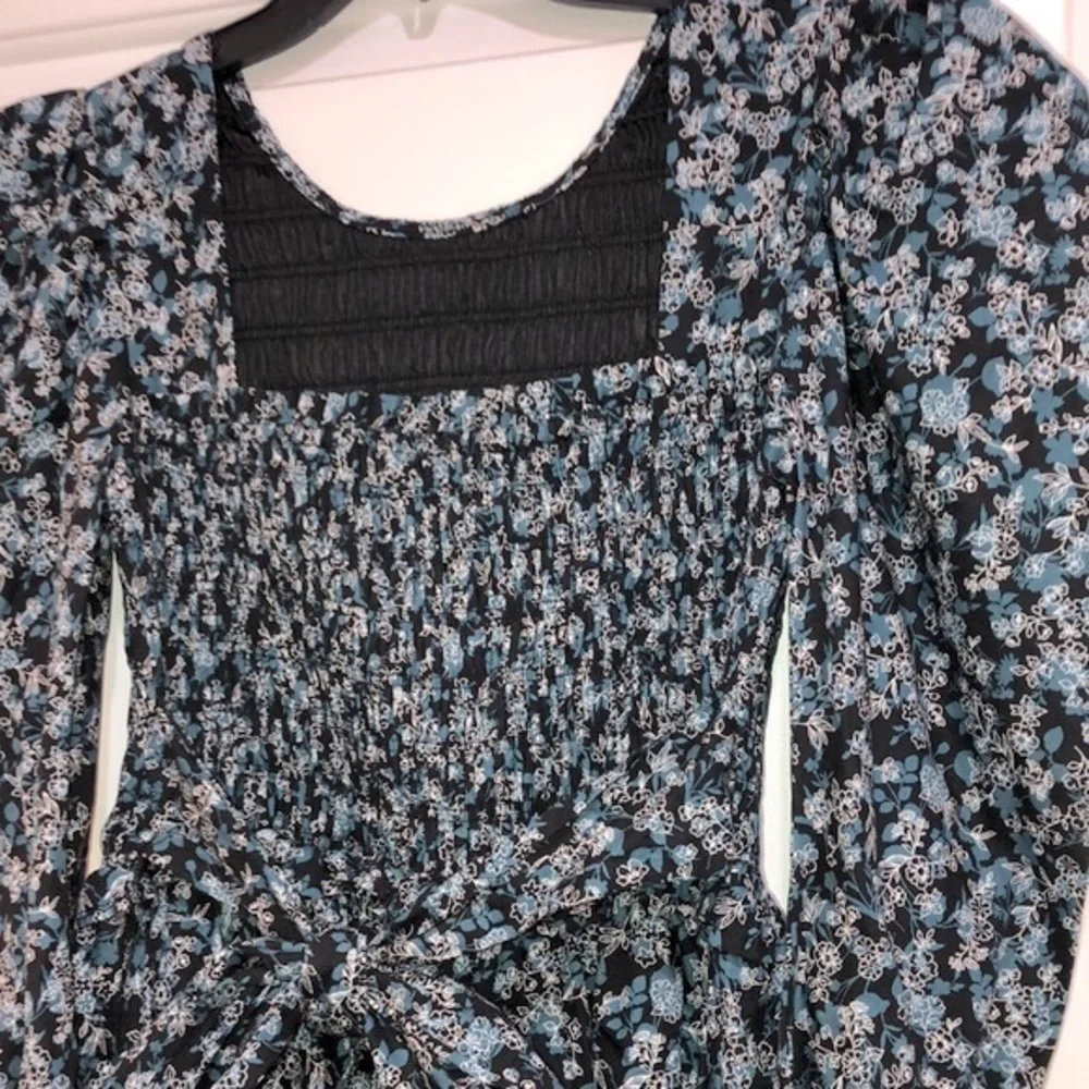 The Polly dress ditzy floral smocked boho dress size medium new with tags
